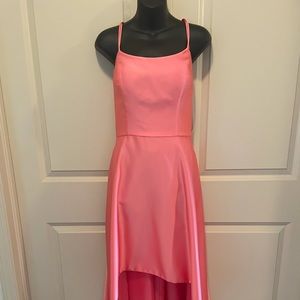 Beautiful bright pink dress worn once. Formal. High low cut